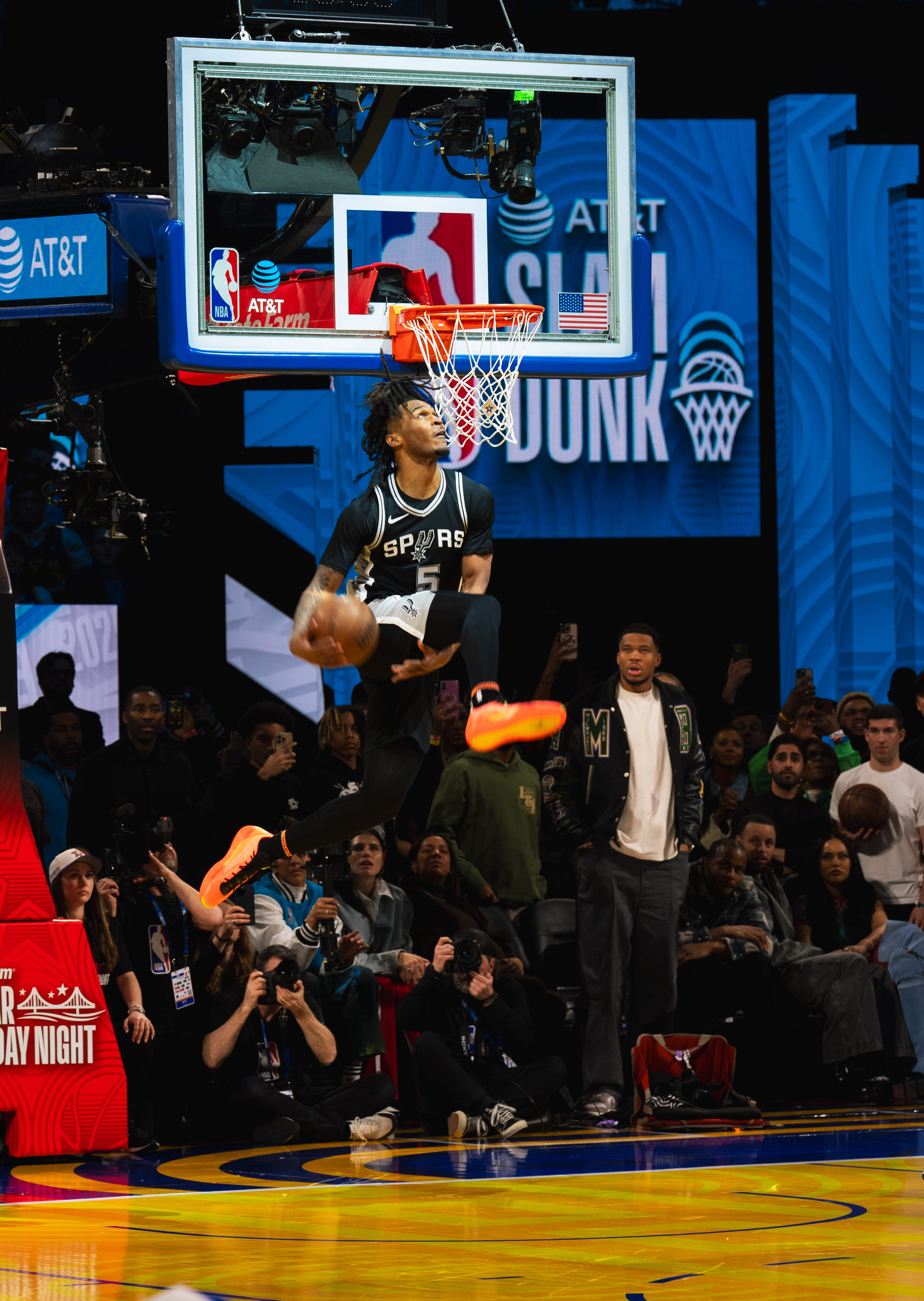 Stephon Castle #5 of the San Antonio Spurs dunking at the 2025 AT&T Slam Dunk Contest