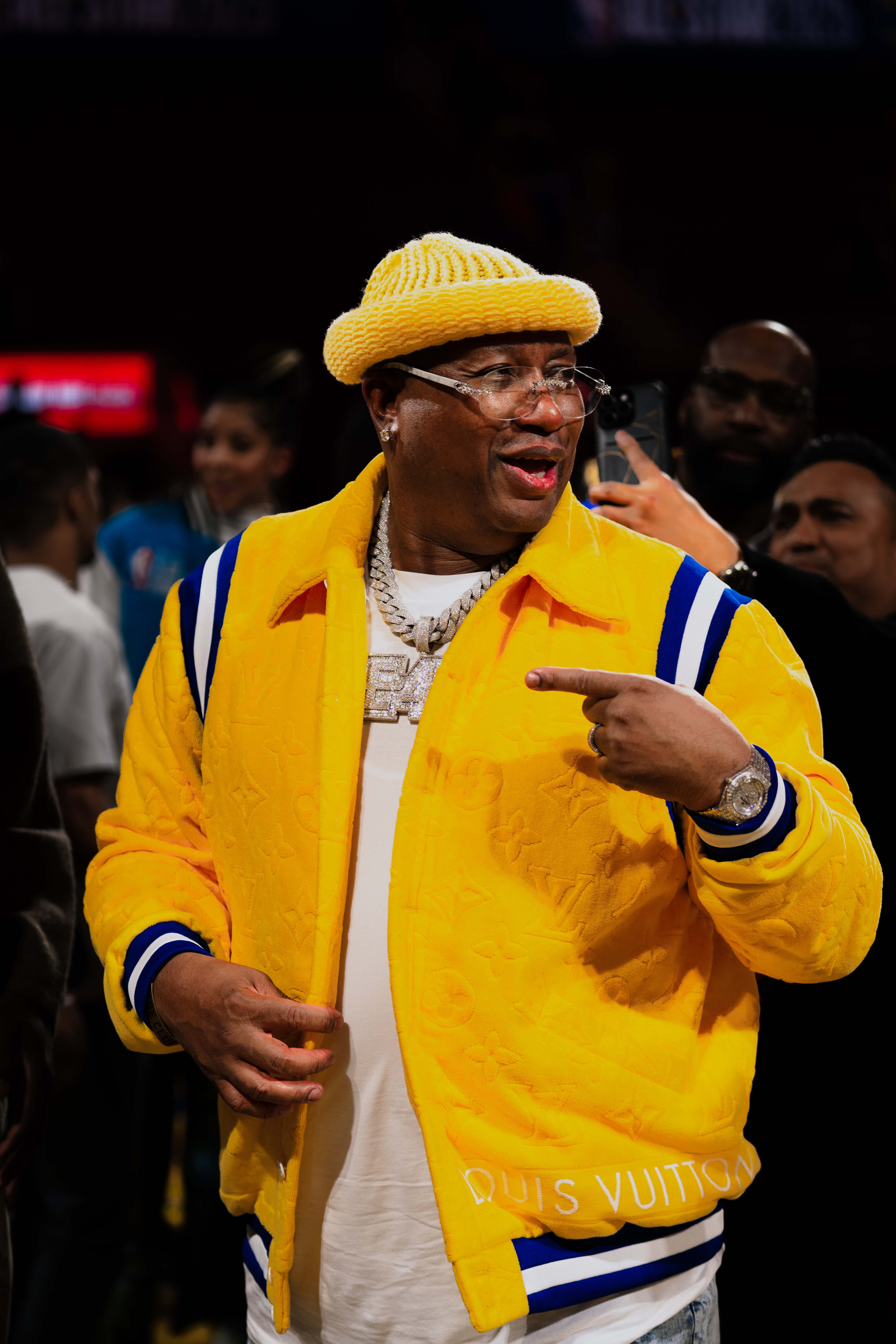E-40 in all yellow Louis Vuitton outfit courtside at the 2025 NBA All-Star Game at Chase Center in San Francisco